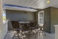"Home Away From Home" nestled into five private acres on an all sports lake!