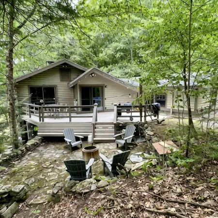 Lakefront cabin with dock, hot tub, fire pit!!
