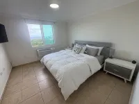 3-Bedroom New Penthouse in Delightful Río Grande with AC, WiFi, Private Terrace. Hotels in Mameyes II