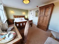 Holmwood House Guest Accommodation - بوتيك