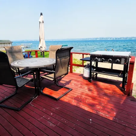 Cozy cabin on Little McDonald with amazing walk out beach!