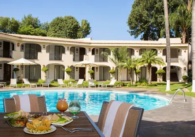 Hotel Guadalajara Plaza Ejecutivo Отели в г. 