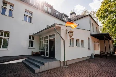 Hotel am Fluss Отели в г. Хайдезе