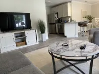 Refurbished villa with golf cart, great location, corner lot