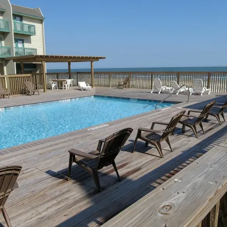 Beachfront Two Bedroom Condo with a Pool/2 nights or 7 nights. Pet friendly!