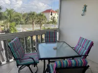 End unit with extra windows. Steps to the beach, private beach access!