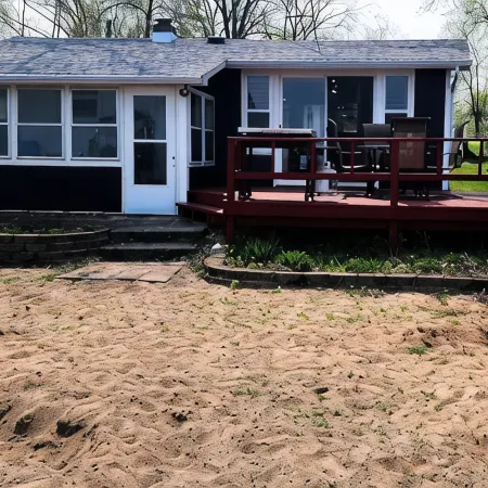 Cozy cabin on Little McDonald with amazing walk out beach!
