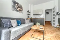 Margi Nell - Joy Apartments - Condos