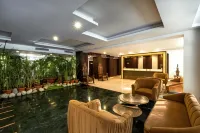 Country Inn Tarika Riverside Resort Jim Corbett فنادق في رامناغار
