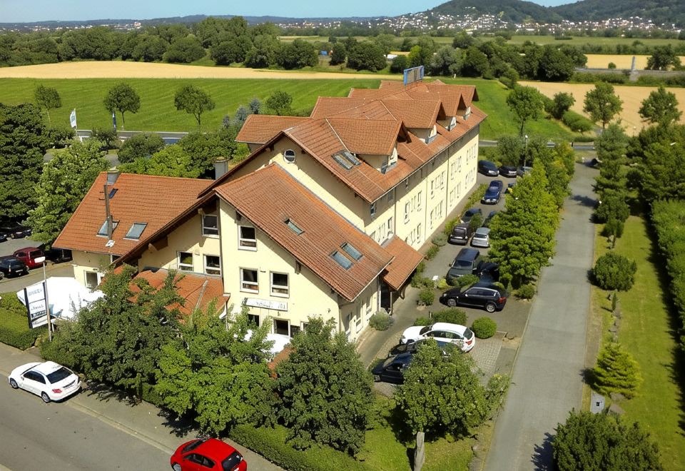 Hotel Parqeo im A66 - Housity