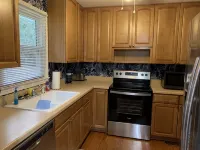Charming house with a large fenced lot in a central location