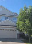 Entire Home in Edmonton South close to Airport with fenced private yard & deck