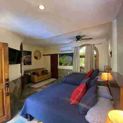 Private Villa, Authentic Cook Included, heated pool, just steps to the beach Rooms