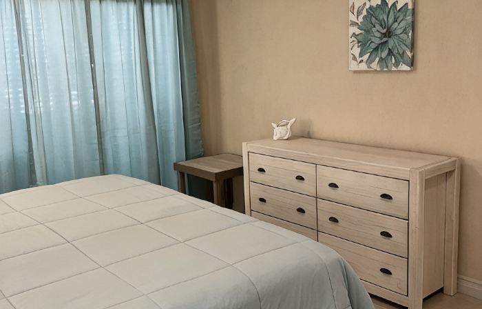 The Harvey Nicole: Modern Caribbean Ocean Front Condo Grand Cayman.