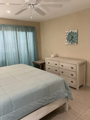 The Harvey Nicole: Modern Caribbean Ocean Front Condo Grand Cayman.