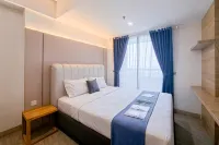 Wooden Tone Studio at Collins Boulevard Apartment By Travelio - 3-Star