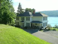 Beautiful House and Yard, Stunning View, 120' Lakefront, Covered Front Porch