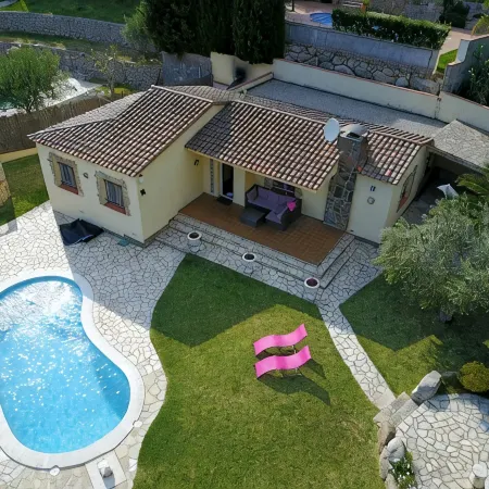 Beautiful house surrounded by an idyllic garden with salt water pool.