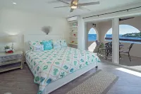 Oceanfront Cowpet Bay Condo Beach, Pool & Generator - Wifi