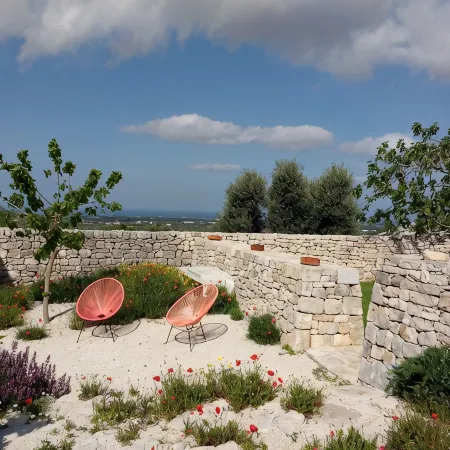Trulli in historic farmhouse in panoramic position between sea and hills