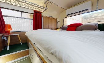 Gozo Bus Glamping - Stay on a 1974 Vintage Maltese Bus in Xlendi