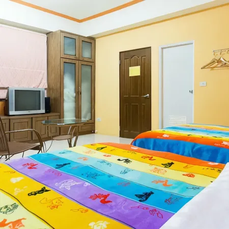 Tomato Coffee Guest House Отели рядом с достопримечательностью «Рыбная гавань Фу Ган»