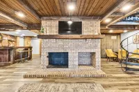 Spacious A-Frame sleeps 25 on 5 wooded acres with a private fishing pond