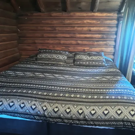Rustic Log Cabin #8 on Crow Lake at Bull Moose Lodge. Family and pet friendly