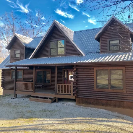 Lake Front Log Home...12 Acres on Private Cove