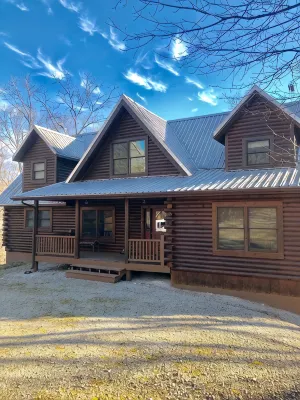 Lake Front Log Home...12 Acres on Private Cove
