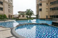 Spacious 1BR at Marina Ancol Apartment By Travelio - Apartments