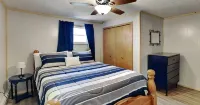 Spacious and cozy home with gas fireplace, boat dock, and lake views
