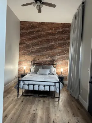 Stylish & Modern 2-Bdrm Apt in Downtown Warsaw featuring an urban rooftop deck.