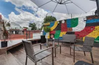 Deluxe Room in Condesa + Rooftop & Coworking - Epsilon by Nomadier - บังกะโล