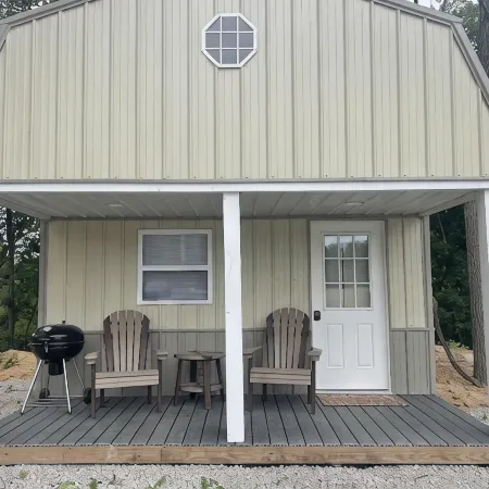 Tan cabin close to University of Central Missouri and Whiteman AF Base