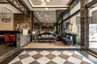 Global Traveler Hotel - Parkplatz