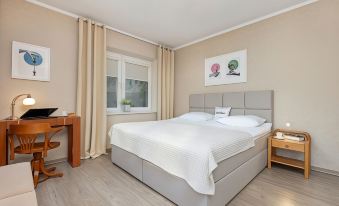 Soft Beige Apartment Raniuszka in Warsaw by Renters