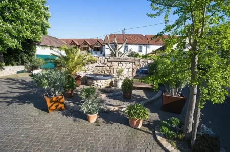 Landhotel Battenheimer Hof Отели в г. Гунтерсблум