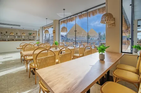 La Boutique Hôtel - Vue Des Pyramides Отели в г. Kafr Nassar