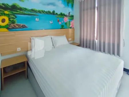 Joy Homestay Near Umj Jember Mitra RedDoorz Отели рядом с достопримечательностью «Lave»