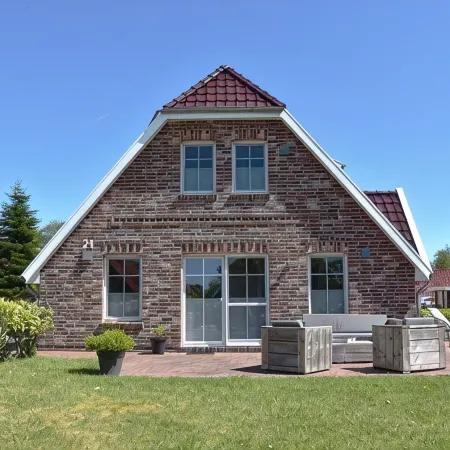 Dream vacation home NordseeStar with fireplace and lounge in Neßmersiel