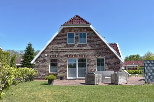 Dream vacation home NordseeStar with fireplace and lounge in Neßmersiel - 3-Star