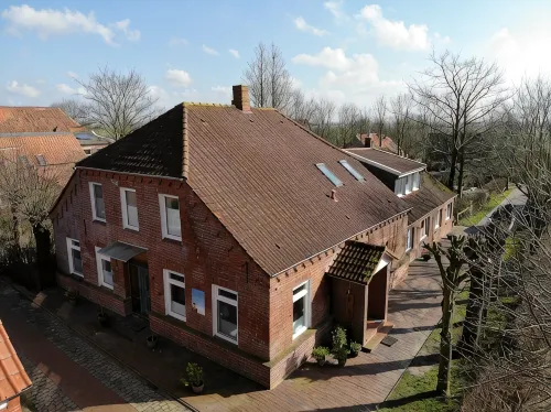 Vacation apartment "Seestern" with large garden in the heart of Pilsum - Homestays