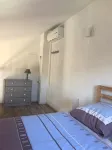 Air-Conditioned Cottage with a Pool, Near the Beach, in a Gated Community - Homestays