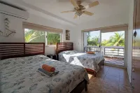 Casa de Playa Tela, San Juan del Mar Hoteles en 
