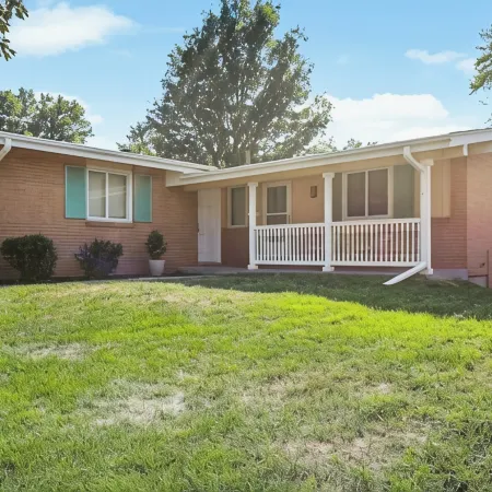 Central Location+ 2 living spaces+ covered patio!