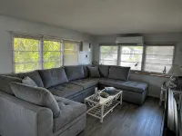Canal-Front Coastal Escape with Private Dock & King Suite - Homestays