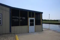Park your boat in front of the Fishermen's Cottage! Screened in patio. - 3-Star