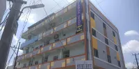 Iroomz Hotel Partha Grand Hotels near STBC Grounds