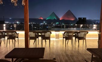 Celia Pyramids View Inn